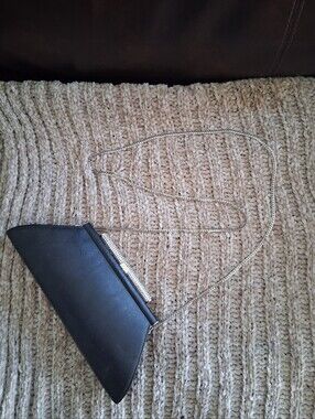 Elegant Black Crossbody Clutch with Gold Chain Strap